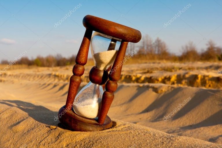 depositphotos_10195620-stock-photo-hourglass-in-desert